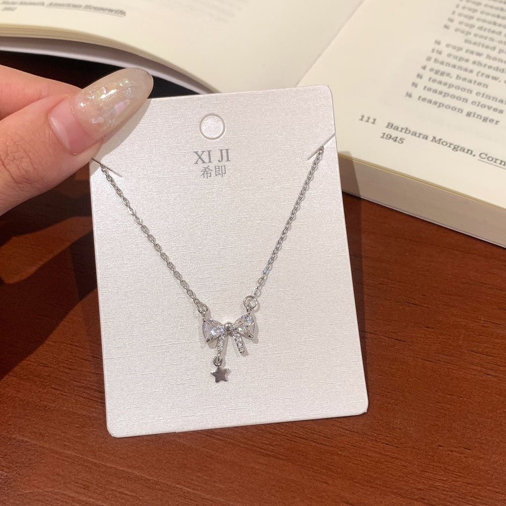 Sparkling Crystal Bow & Star Pendant Necklace