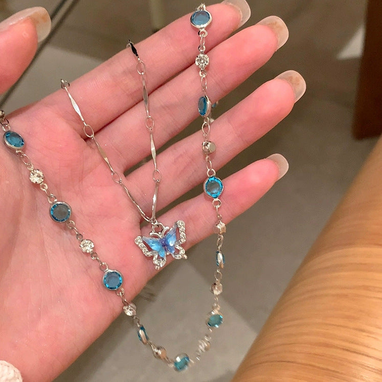 Sparkling Ocean Blue Butterfly Layered Necklace close-up