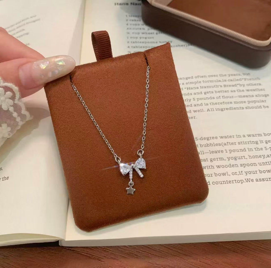 Sparkling Crystal Bow & Star Pendant Necklace