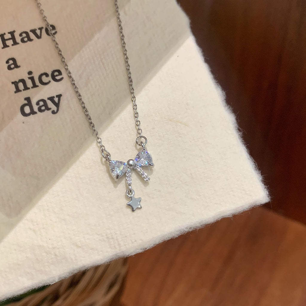 Sparkling Crystal Bow & Star Pendant Necklace