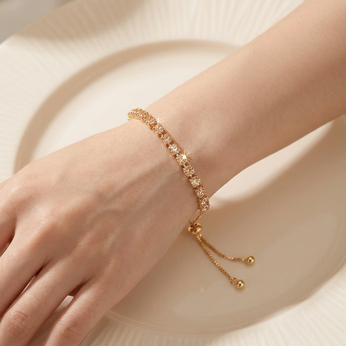 Champagne Crystal Bezel Station Bolo Bracelet on wrist