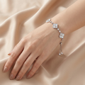 Frosted Mother-of-Pearl Clover Adjustable Bolo Bracelet on wrist